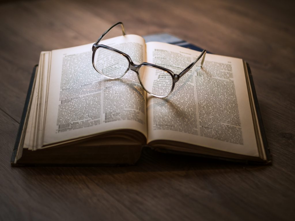 Glasses resting on a book