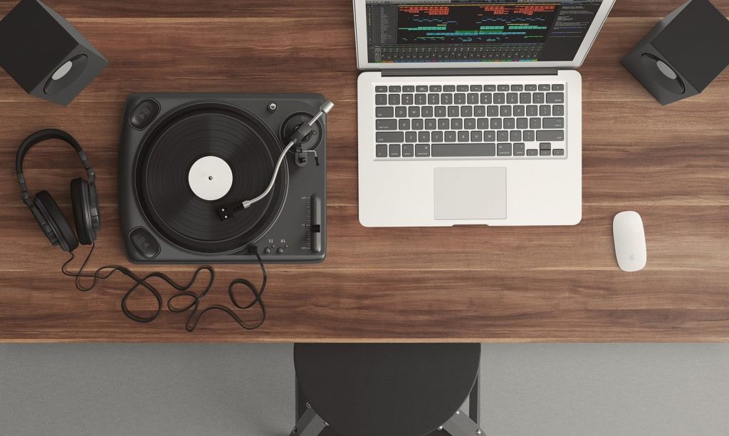 Desk with laptop and turntable