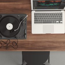 Desk with laptop and turntable
